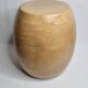 Brutalist monoxyle stool in solid mango wood with an organic shape.
