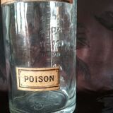 Ancienne bouteille graduée d'apothicaire en verre et son bouchon