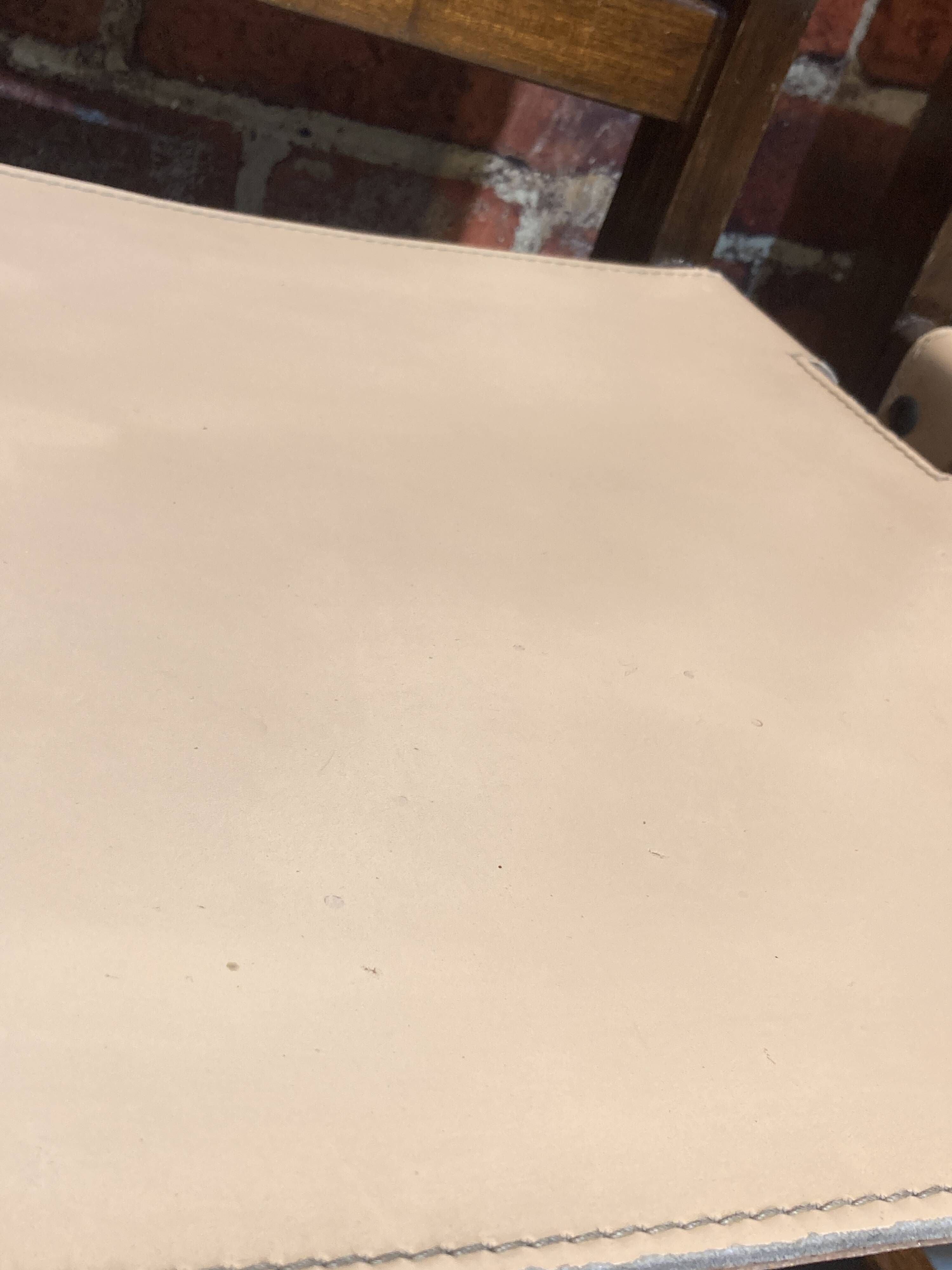 Set of four wooden and leather chairs from Maison Regain