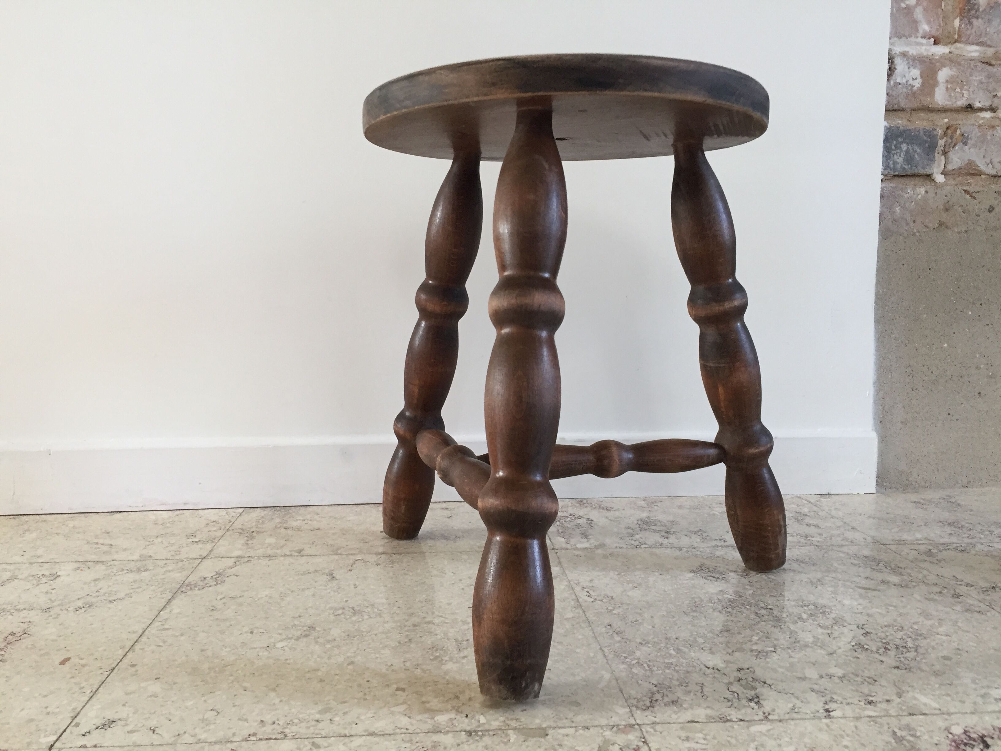 Wooden stool turned vintage tripod