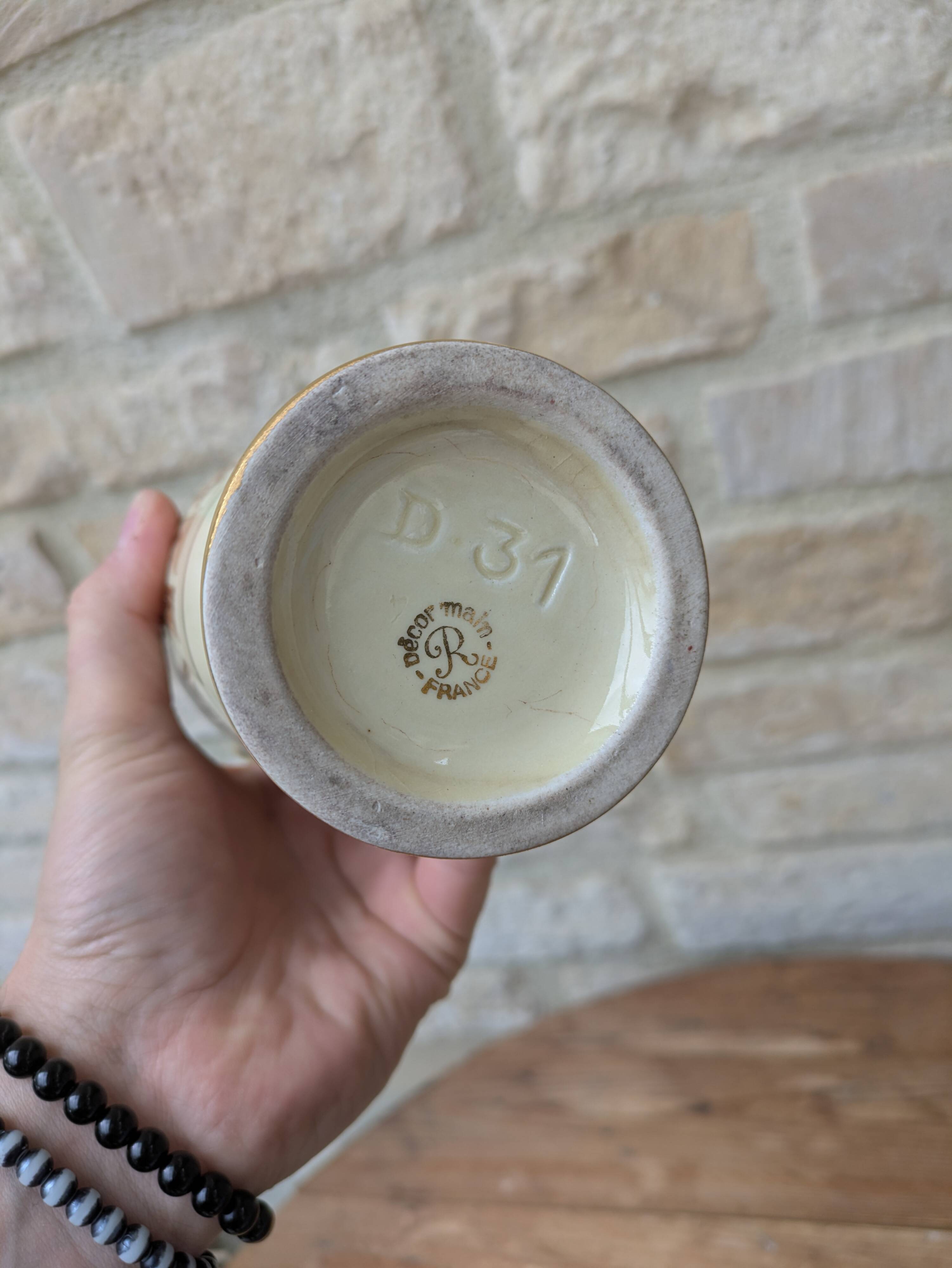 Antique amphora-shaped vase with Roman or Greek decoration