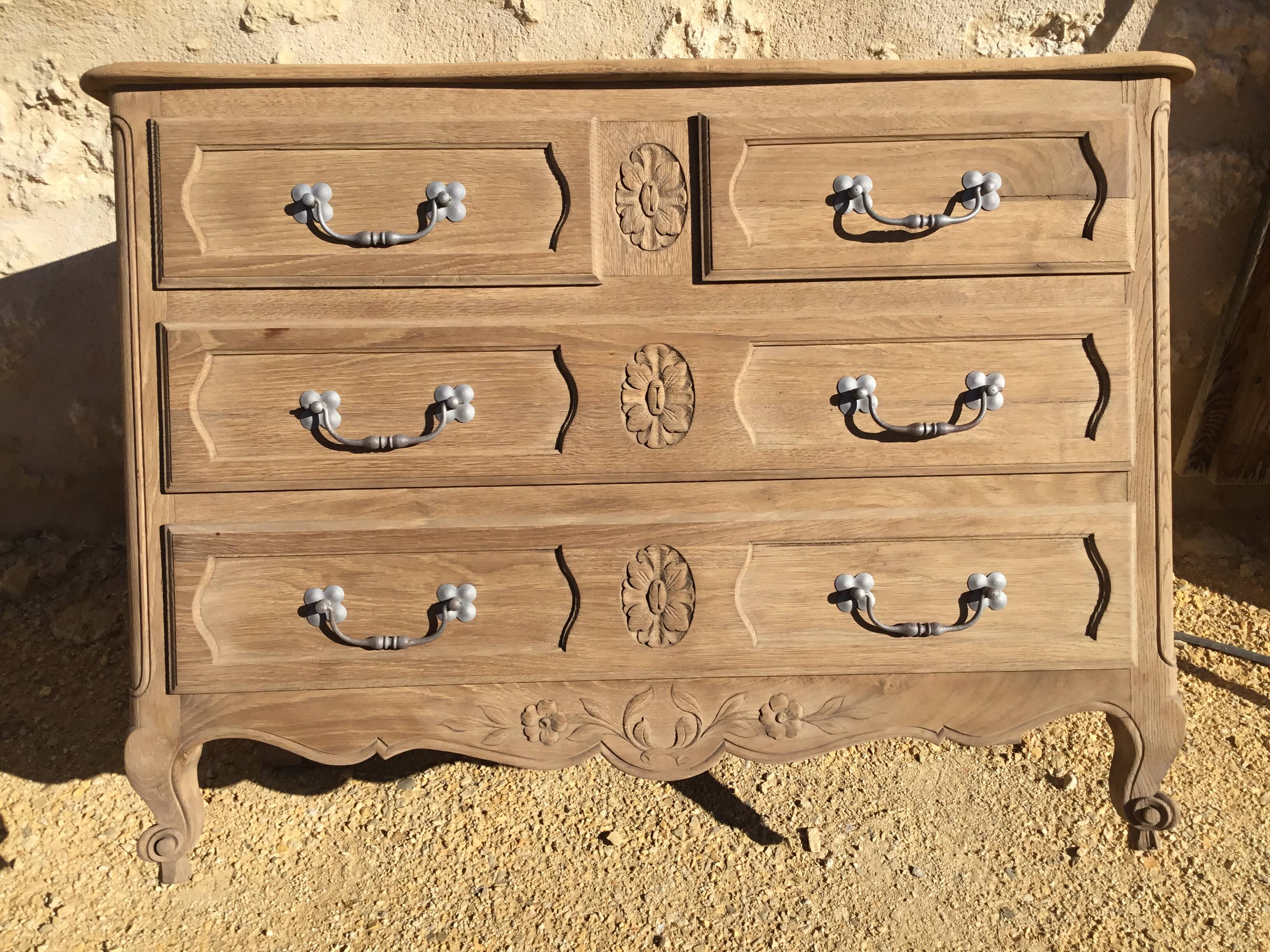 Louis XV style chest of drawers in stripped oak and left in natural wood
