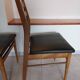 5 Scandinavian style chairs, wood and black faux leather.