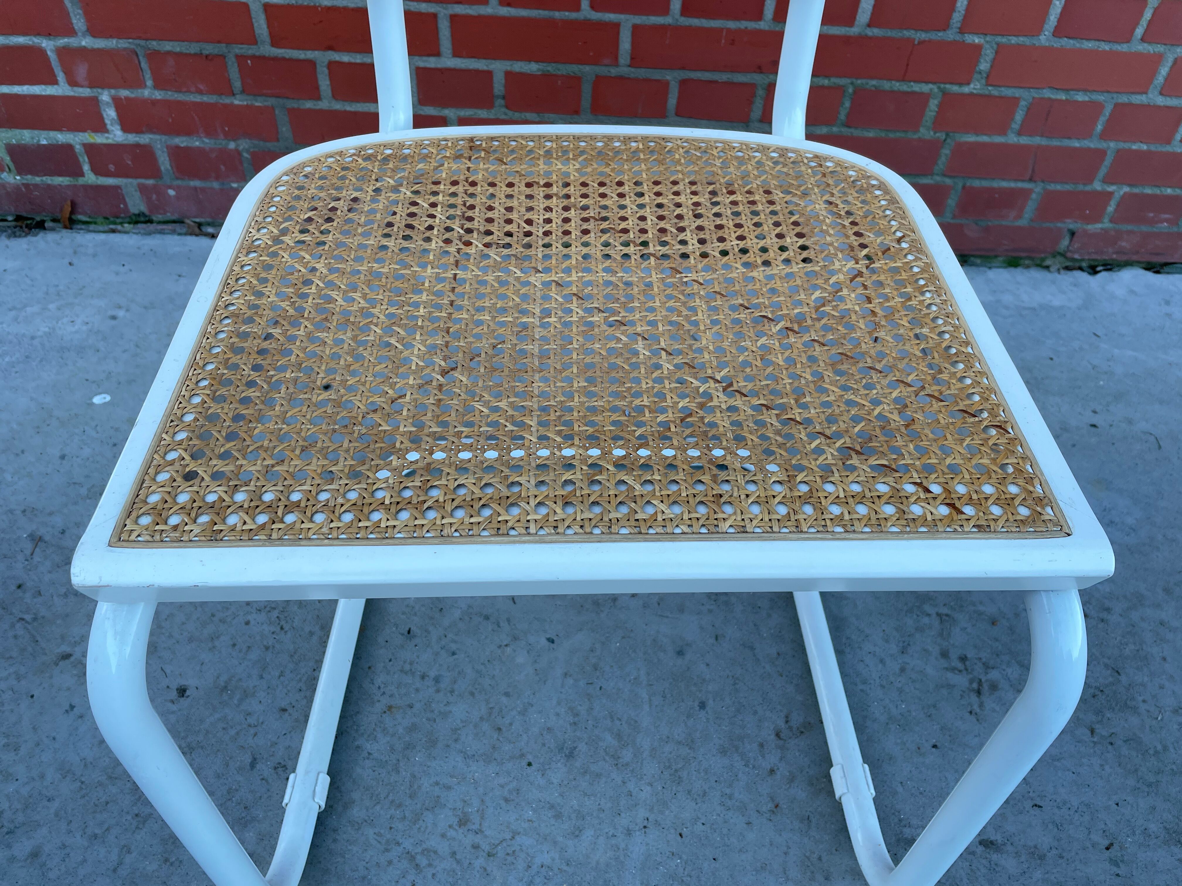 Cesca Chair model with armrest in white