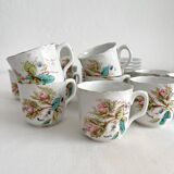 12 ironstone coffee cups with polychrome floral decoration, KG Lunéville