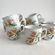 12 ironstone coffee cups with polychrome floral decoration, KG Lunéville