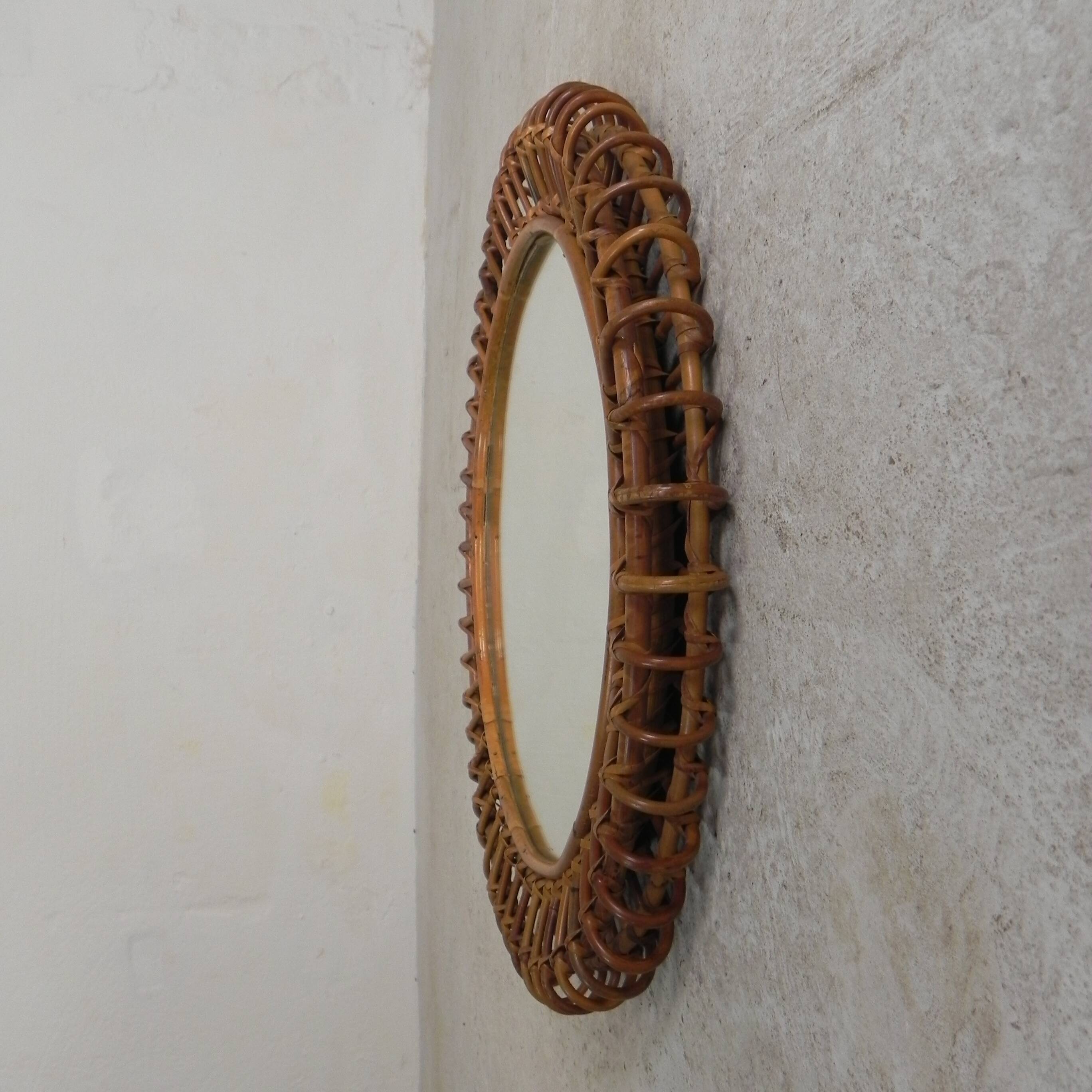 Round vintage mirror with bamboo edge