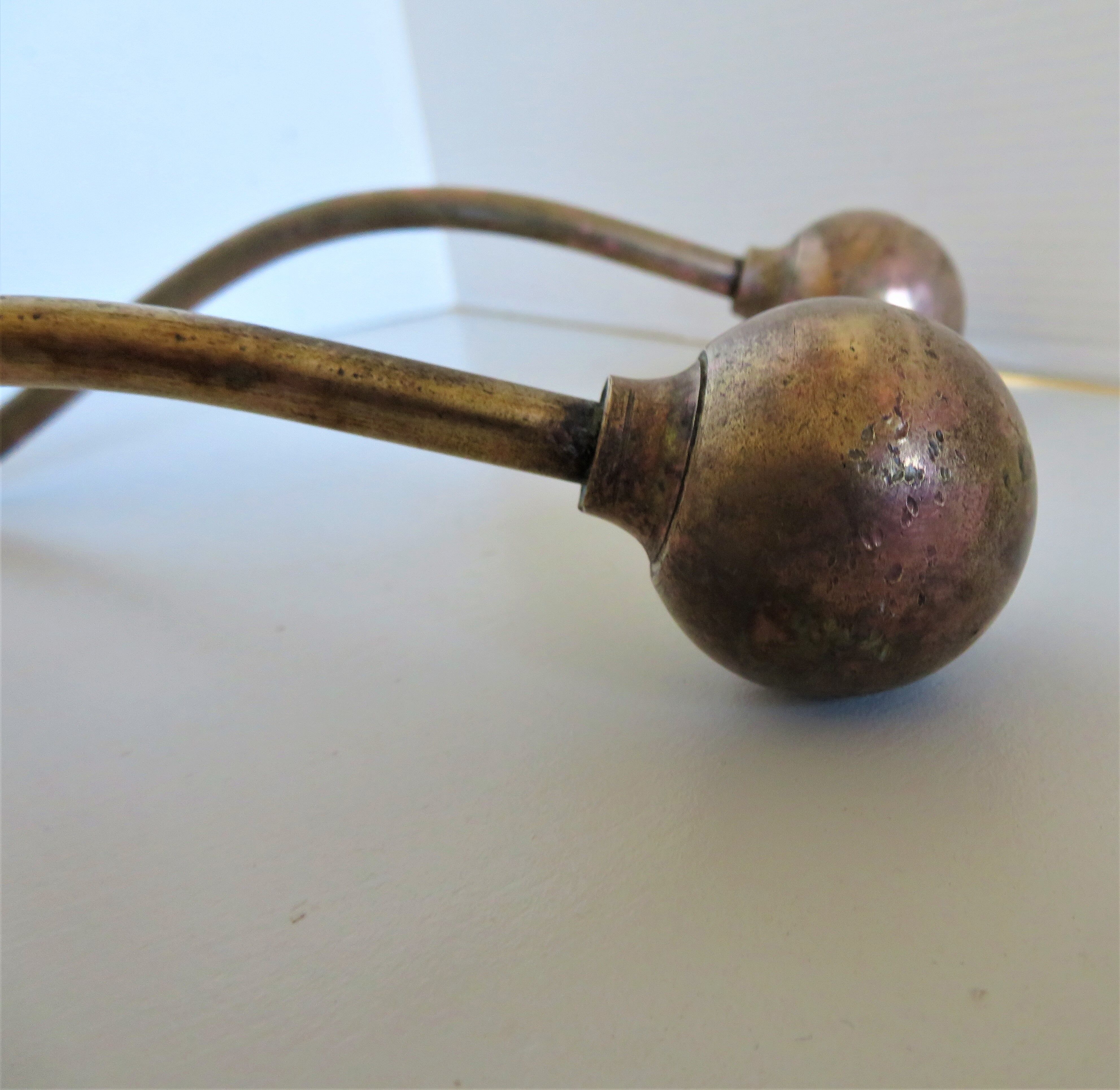 Pair of brass hooks