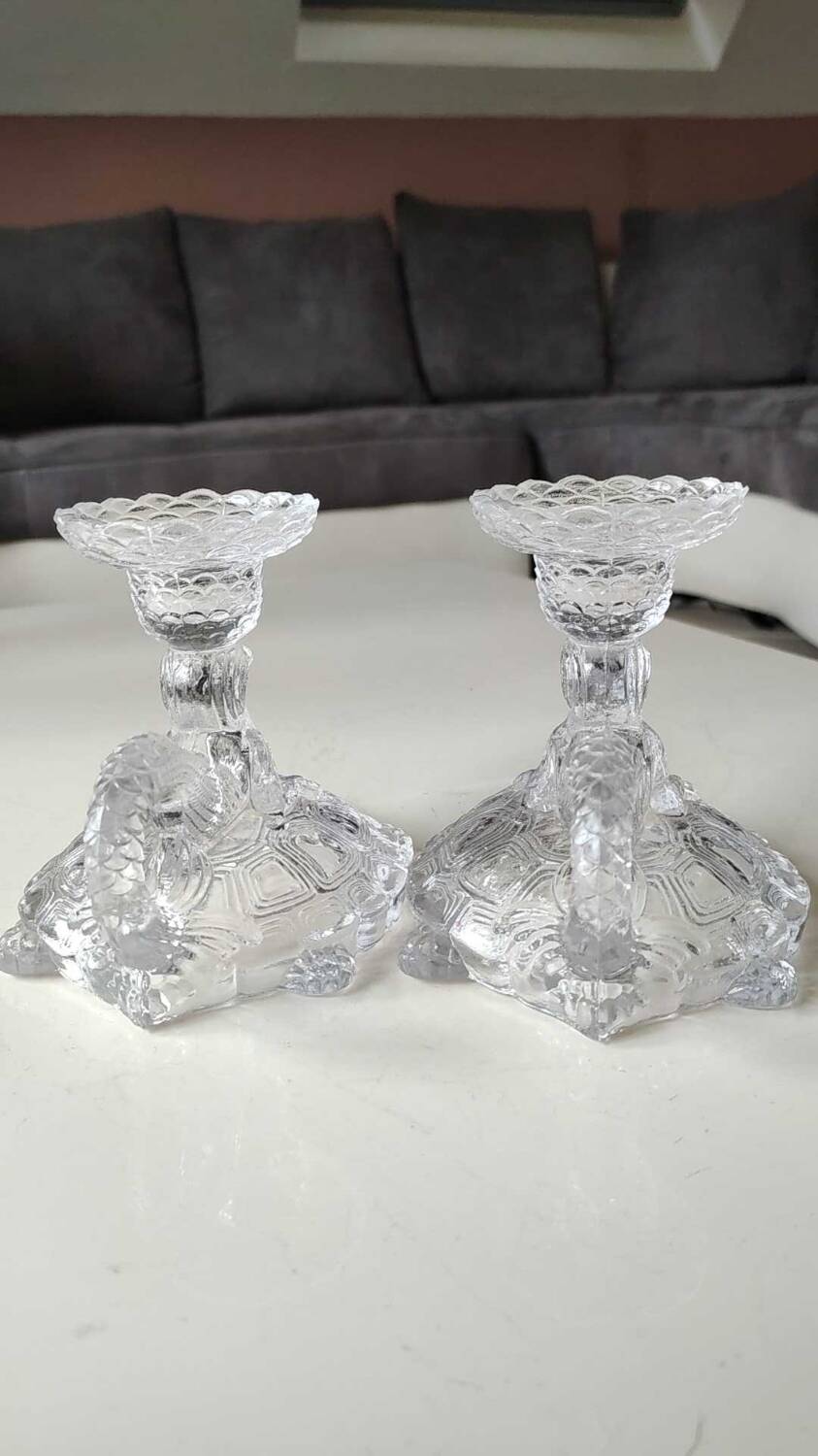 Pair of hand candlesticks/glassware from Portieux/Vallerysthal. In molded glass. Zoomorphic form of turtle carrying a griffin on its back.