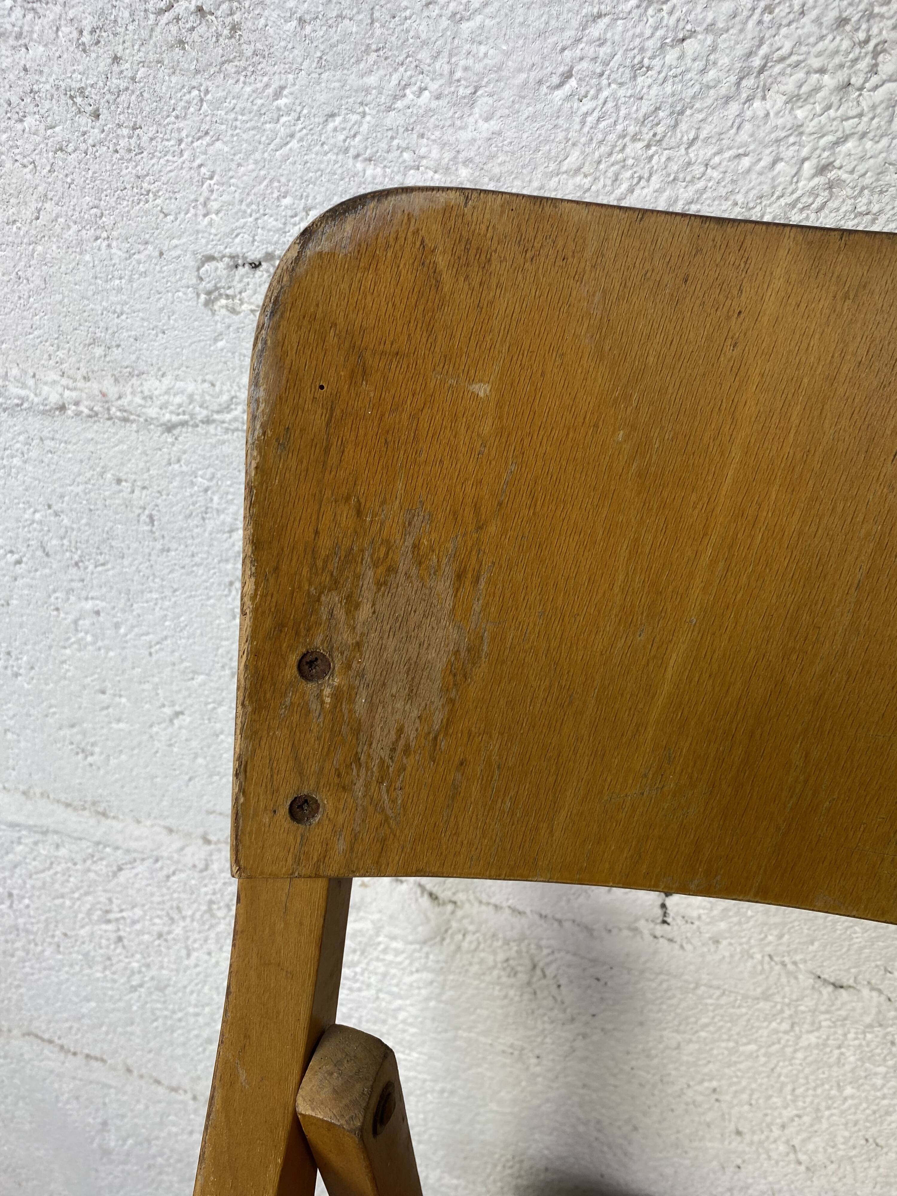 Pair of mismatched wooden folding chairs
