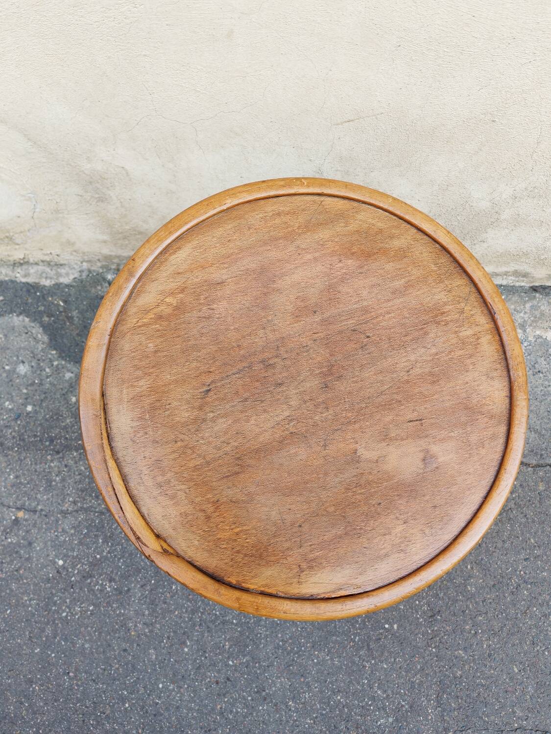 Curved wooden stool