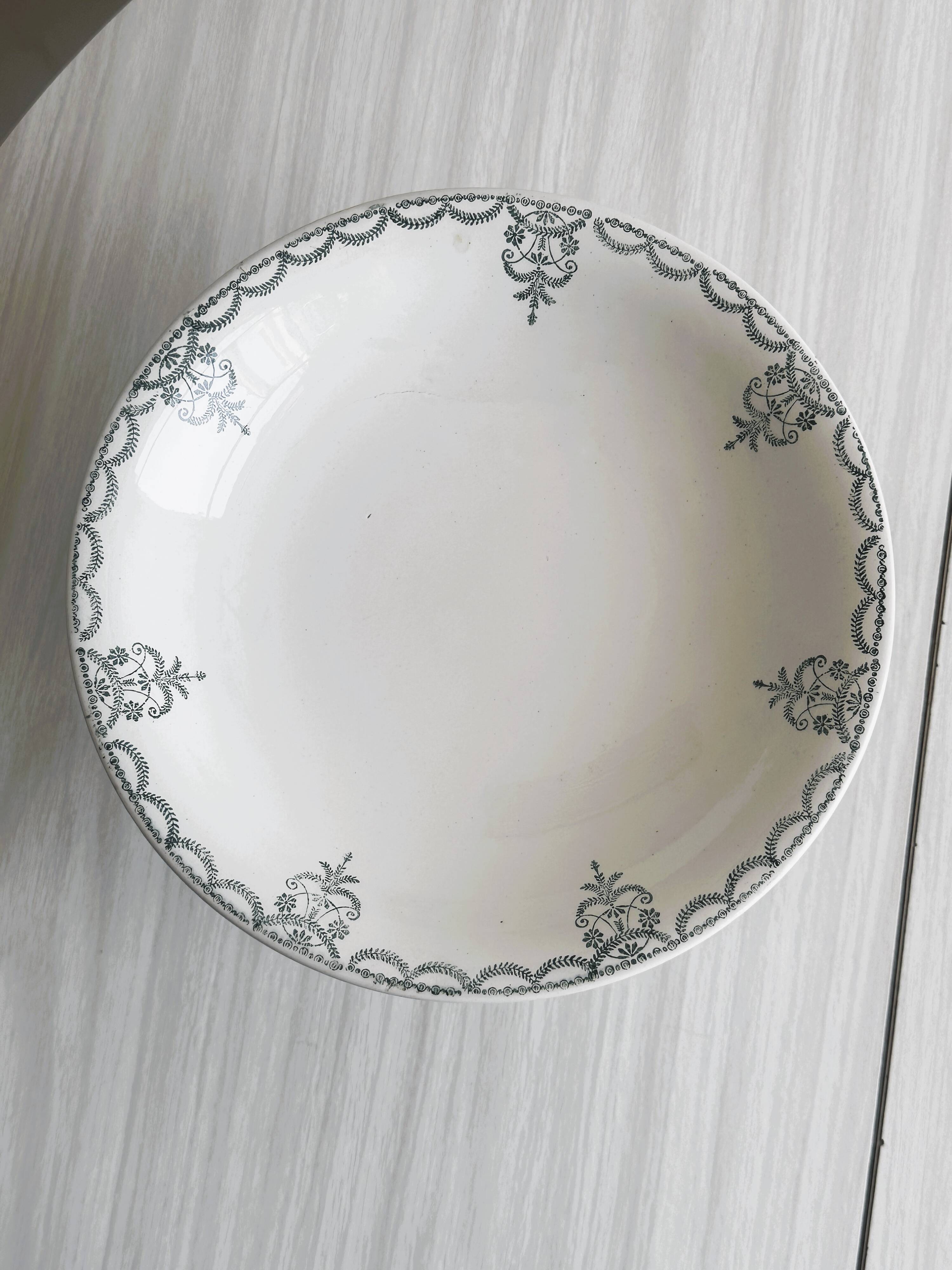 Earthenware fruit bowl on foot