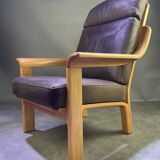 Chocolate leather armchair, wooden structure