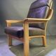 Chocolate leather armchair, wooden structure