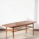Vintage Scandinavian coffee table in teak and rattan – Danish design from the 1960s.