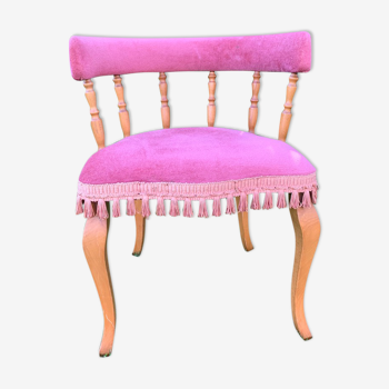 Pink gondola armchair with fringe