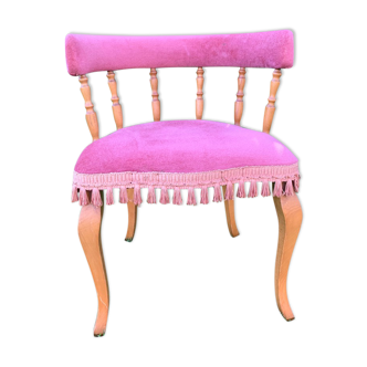 Pink gondola armchair with fringe