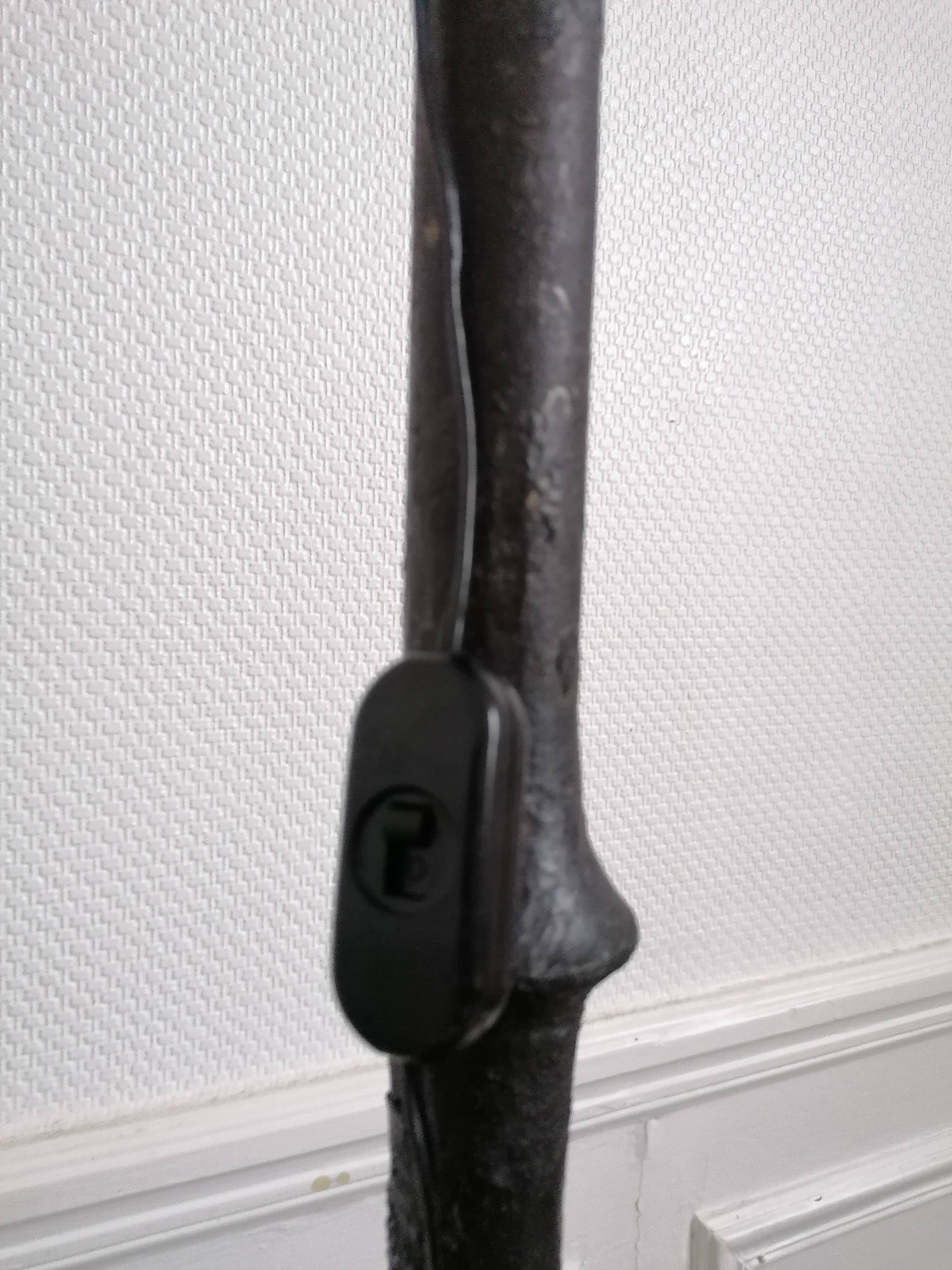 Tripod lamp in wrought iron