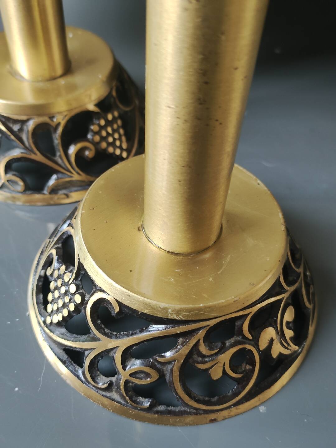 Pair of Hebrew Candlesticks. In antique gold-plated brass. Signed FFS Israel