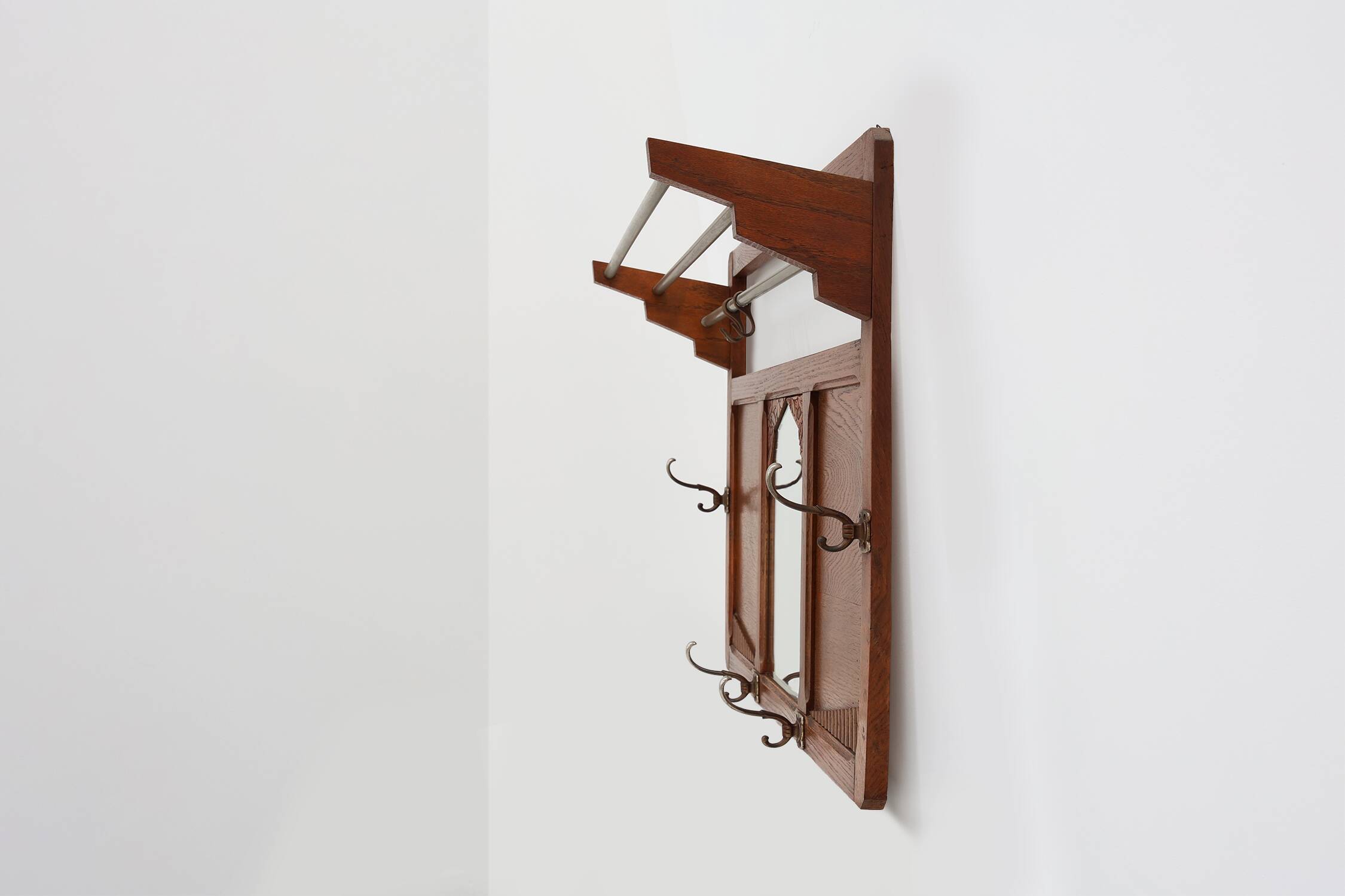 Art Deco oak carved wall coatrack with mirror, France 1920s