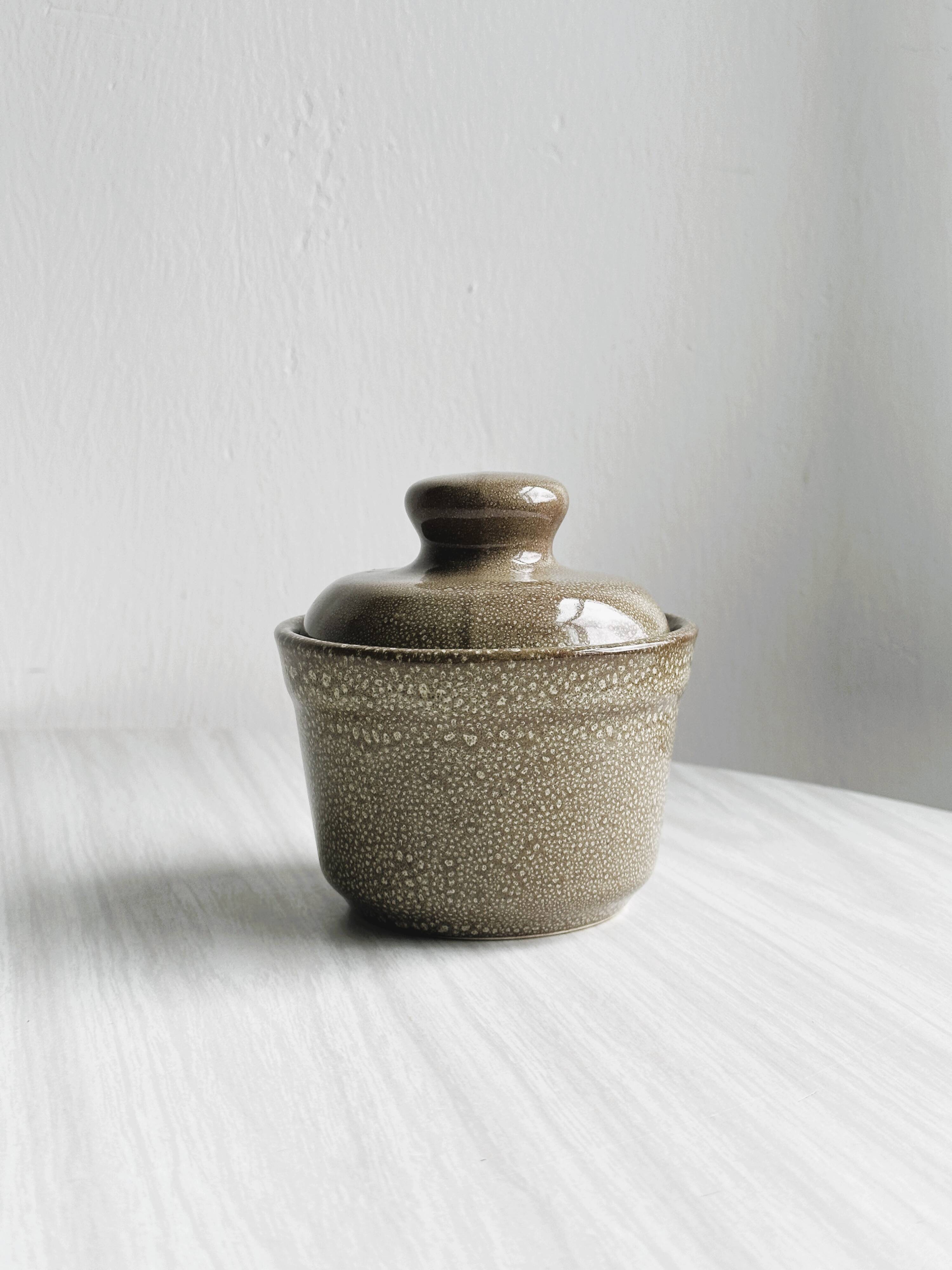 Small stoneware pot and lid