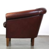 Nice sheepskin club chair with a beautiful patina