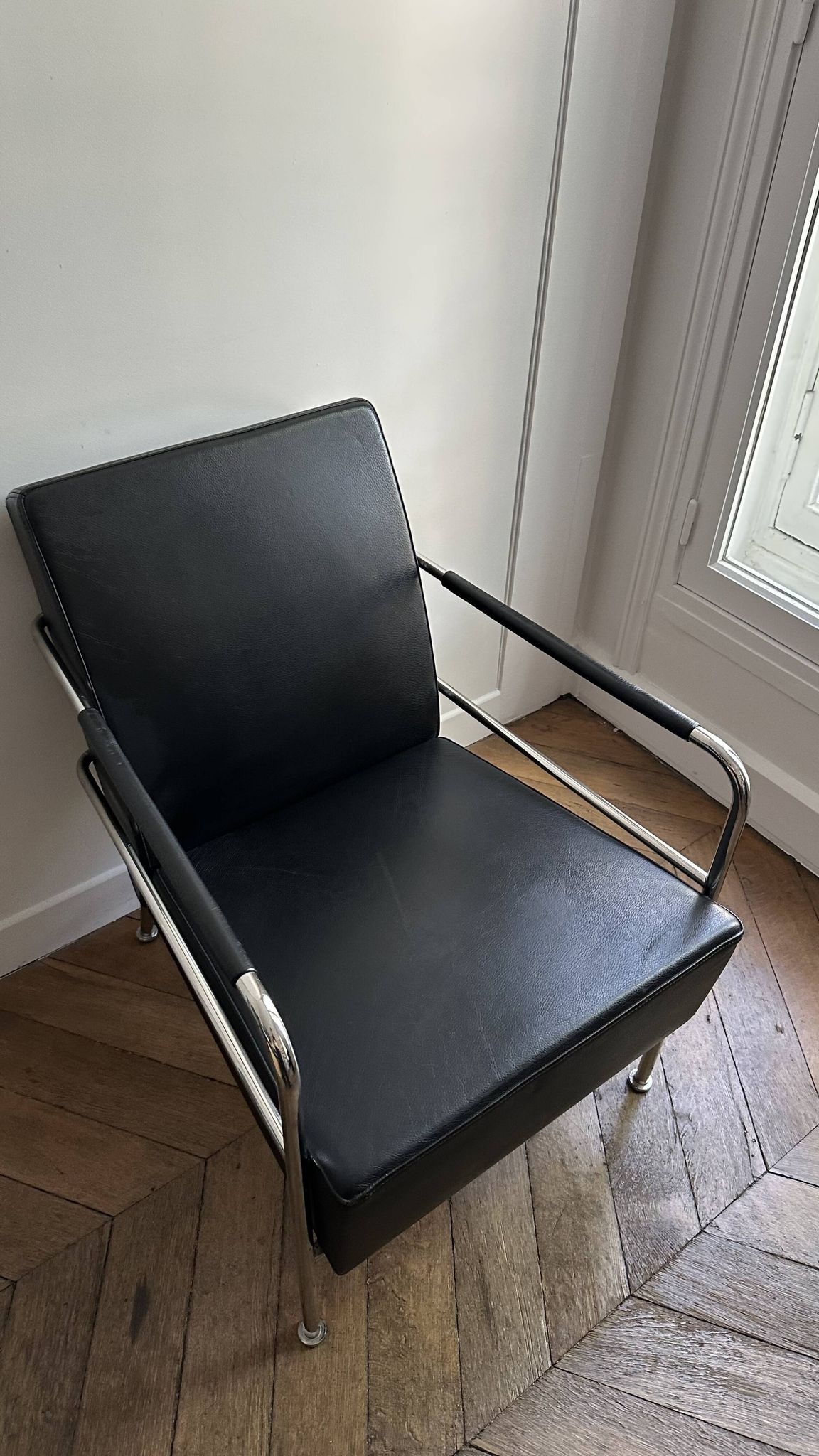Sofa and armchair in Swedish black leather by Gunilla Allard for Lammhults.