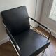 Sofa and armchair in Swedish black leather by Gunilla Allard for Lammhults.