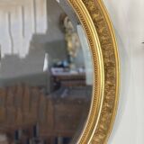 Mirror / oval ice Napoleon III period in wood and gilded stucco louis xv style