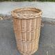 Woven laundry basket with rattan and wicker lid