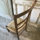 Chaise basse paillée de nourrice en merisier