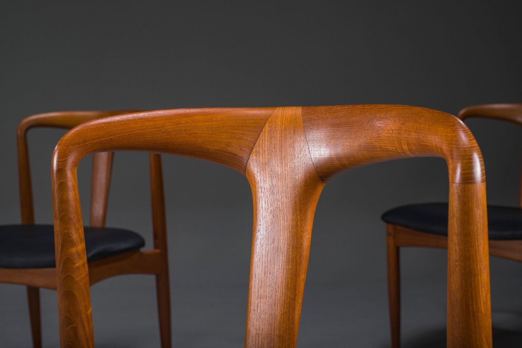 Juliane dining chairs in teak and black leather by Johannes Andersen for Uldum Møbelfabrik, Denmark, 1960s, set of 6