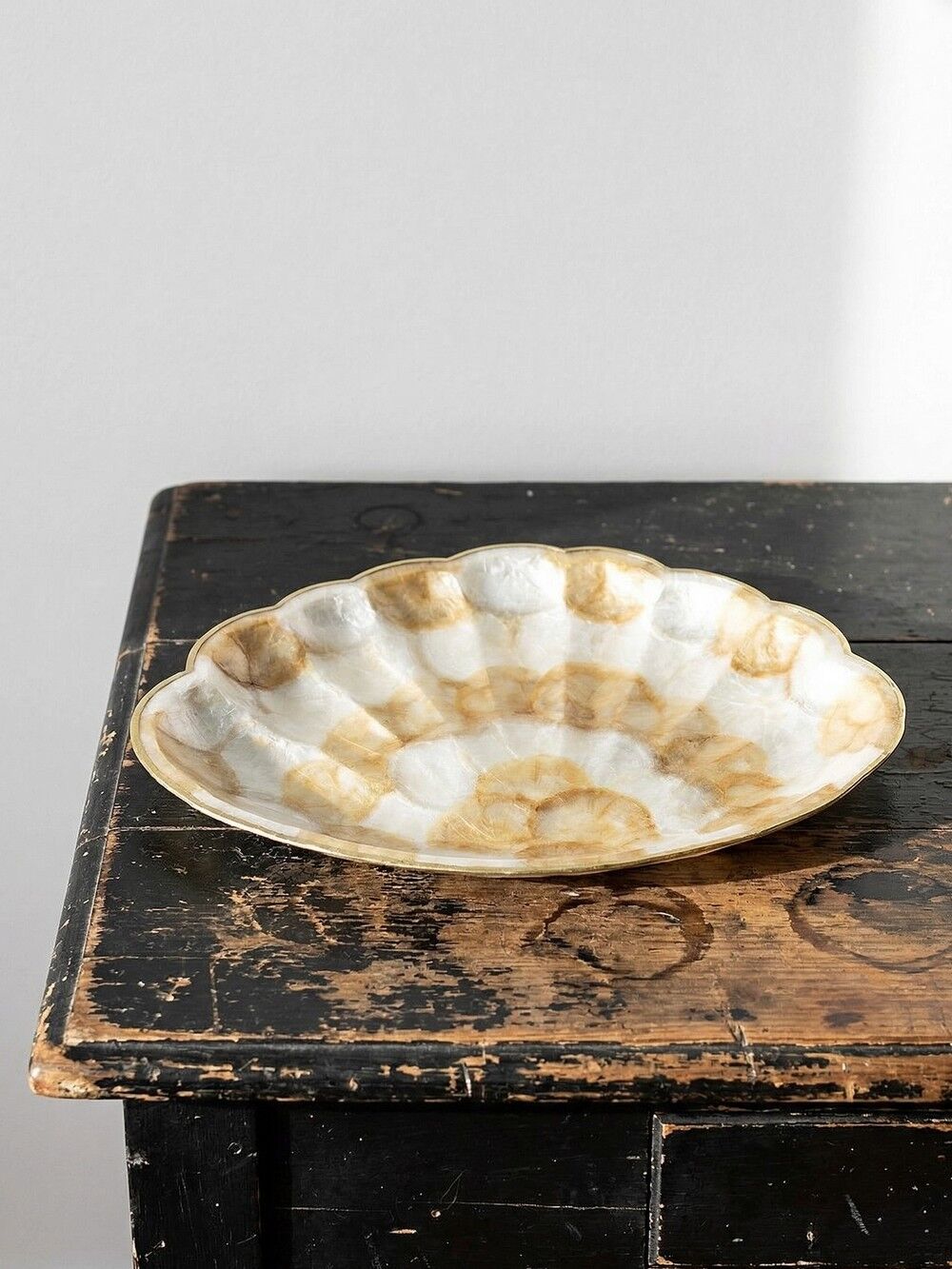 Large platter or shell-shaped catchall in capiz mother-of-pearl and vintage brass.