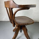 Baumann rotating wooden armchair
