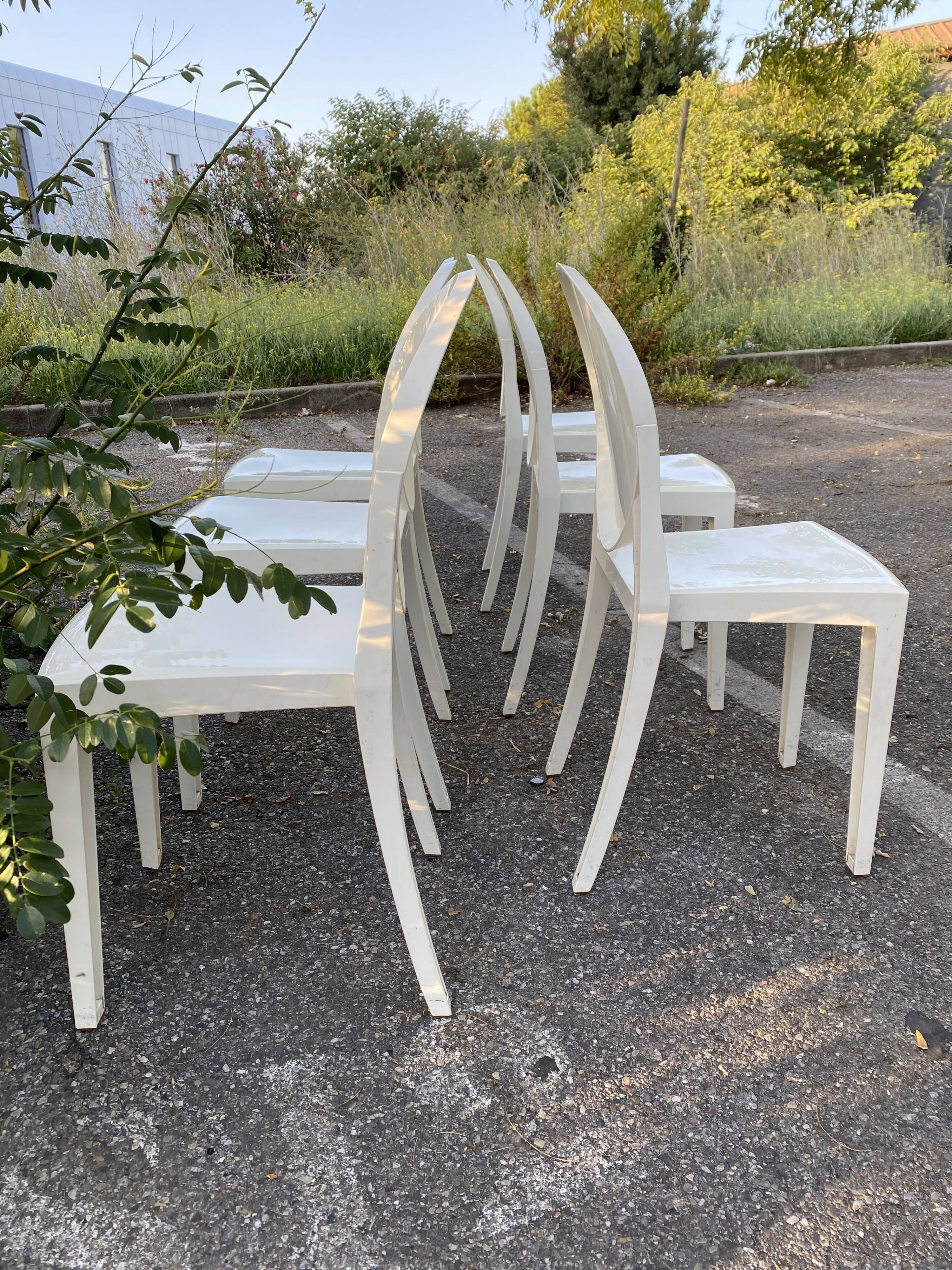 Set of white Victoria Ghost chairs by Philippe Starck for Kartell