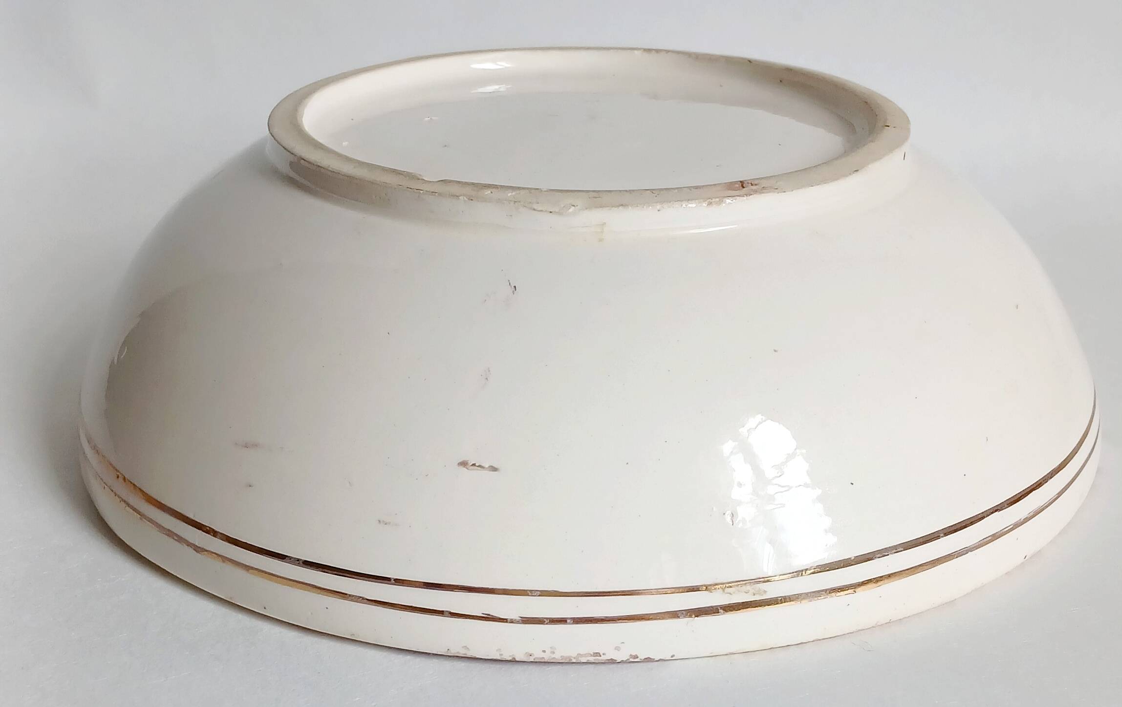 Ancient bowl inspired by parietal or rock art, hand-painted.