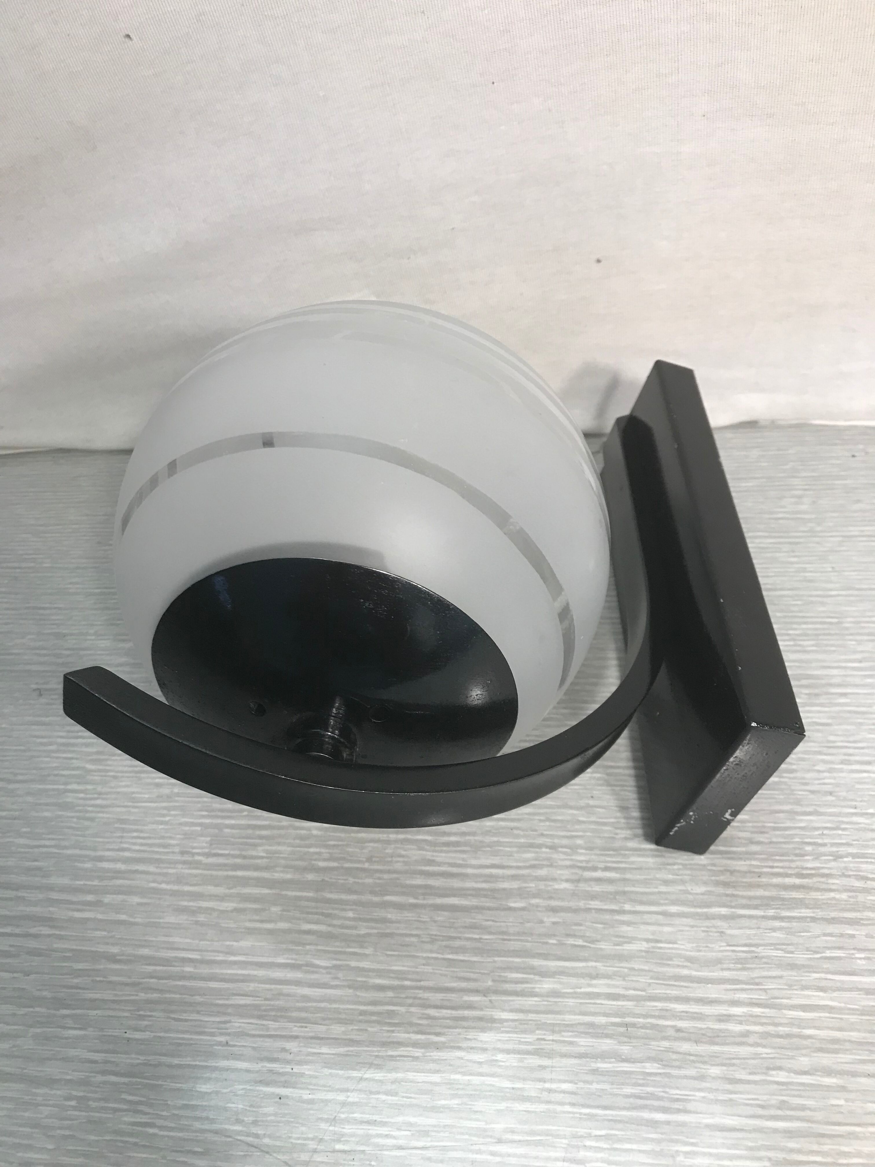 Vintage wall sconce ball-shaped glass reflector and black metal sconce