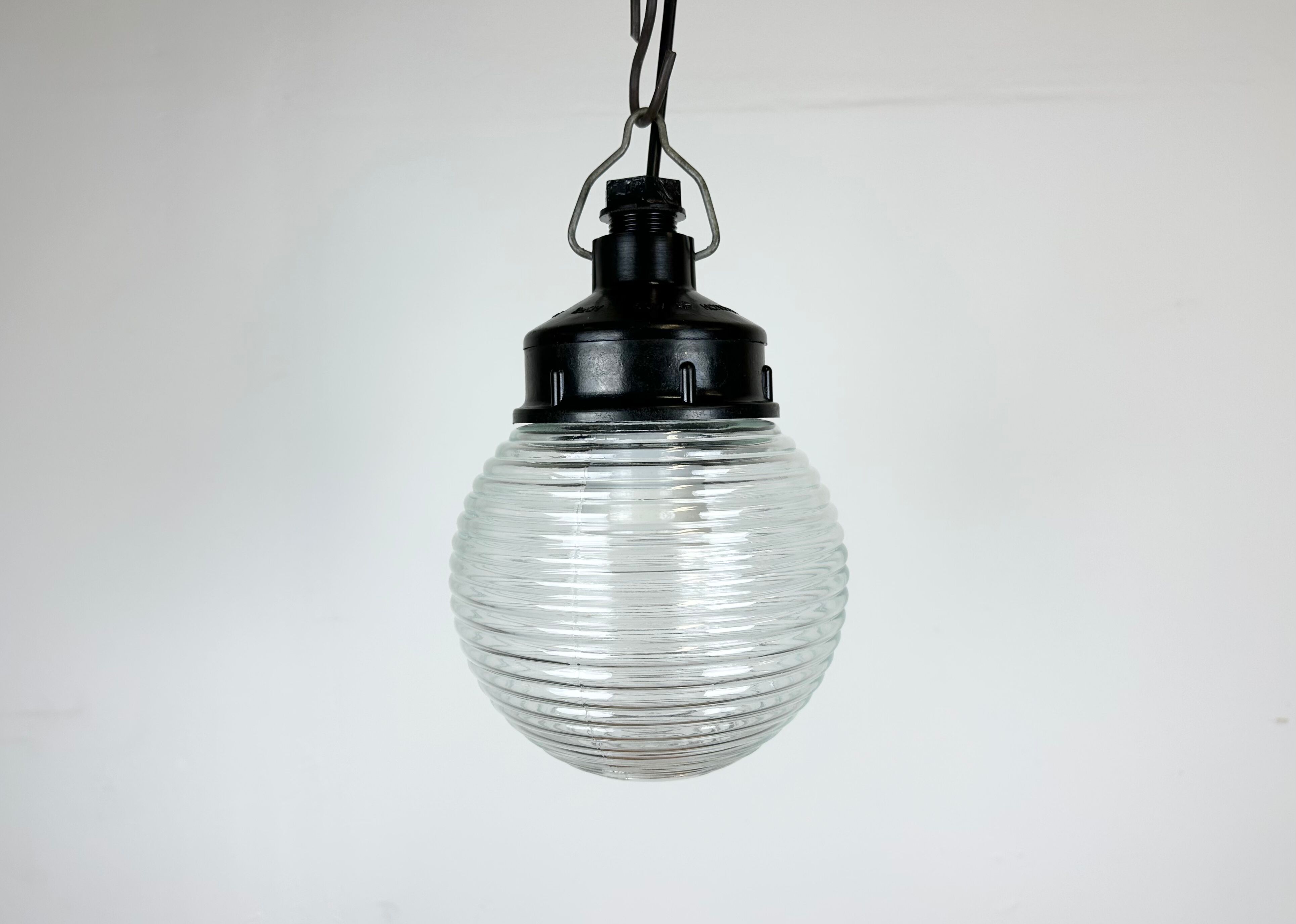 Industrial bakelite pendant light with ribbed glass, 1970s