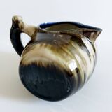 Vintage earthenware pitcher