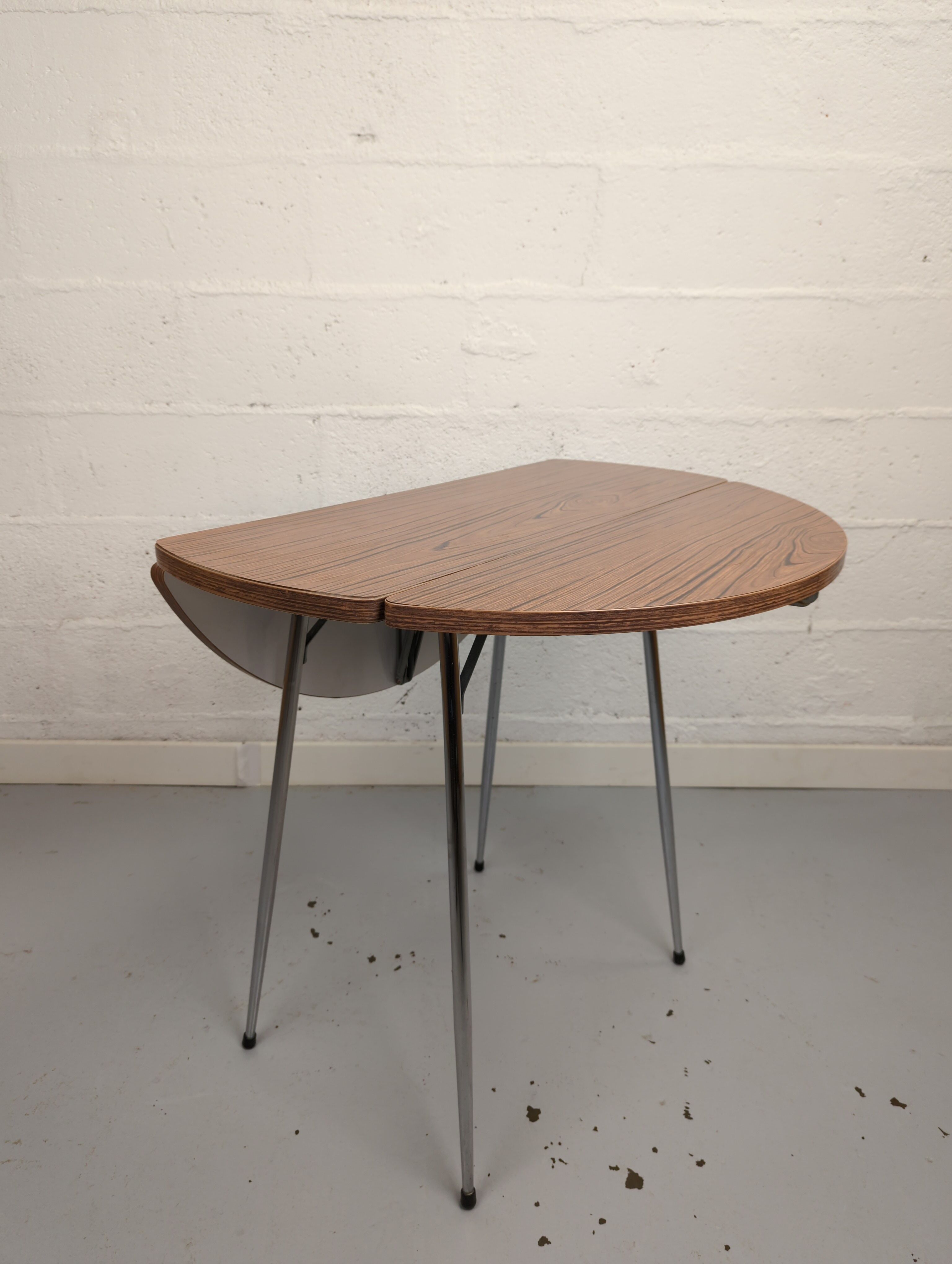 Foldable brown formica table compass legs