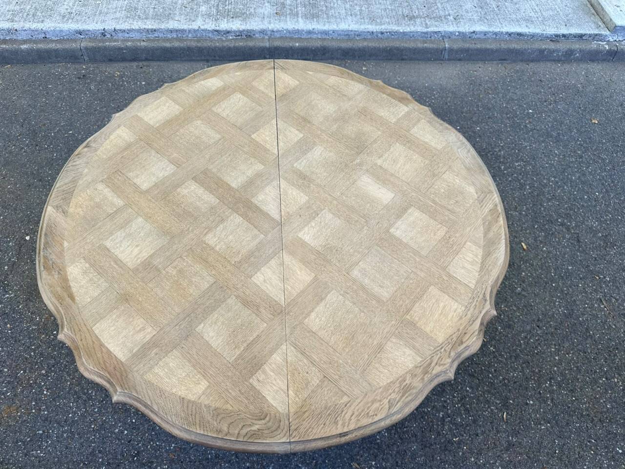 Round extendable dining table Louis XV stripped in solid oak 1950