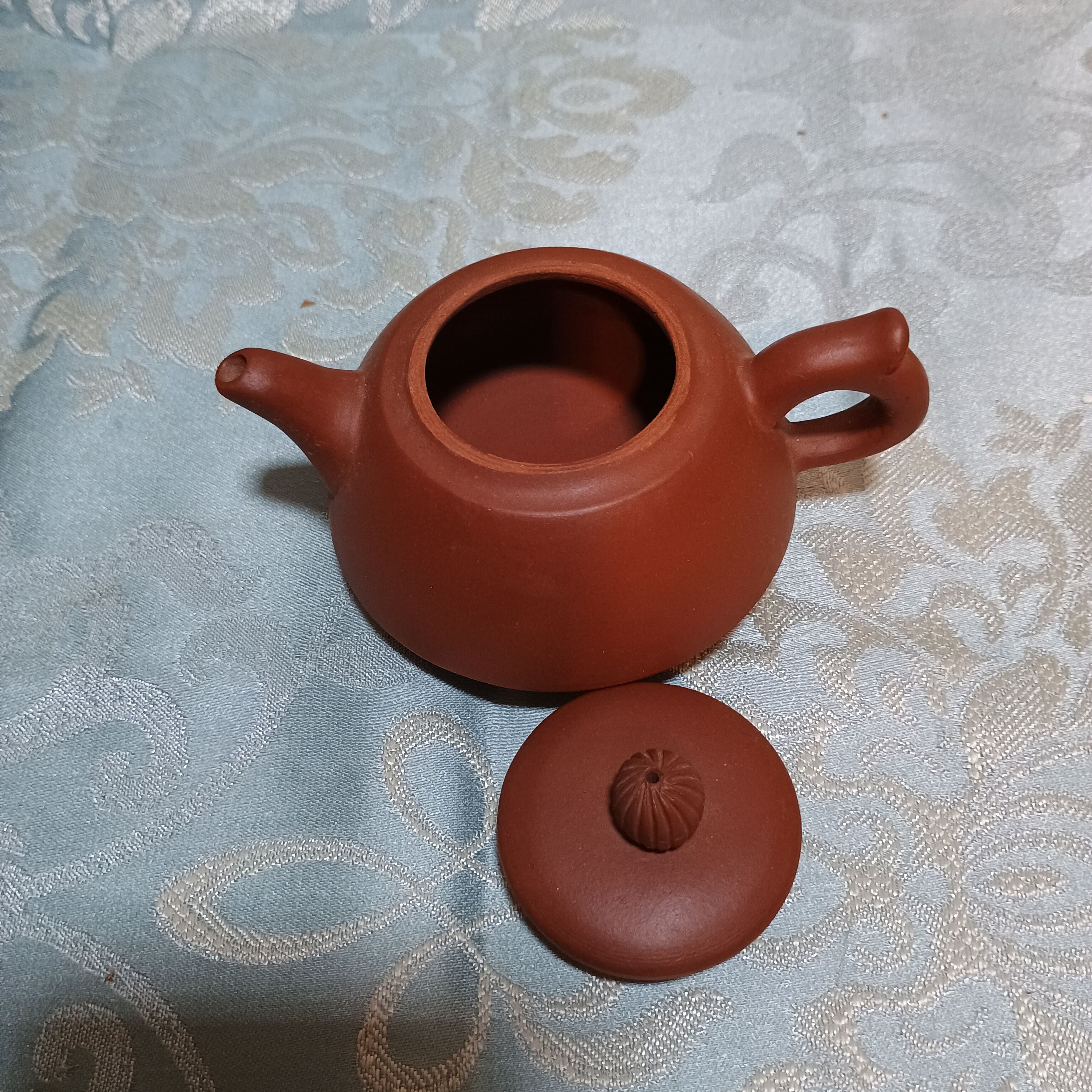Yixing teapot in signed red clay