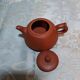 Yixing teapot in signed red clay