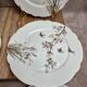 Set of 7 antique porcelain plates – Decorated with polychrome birds and flowers
