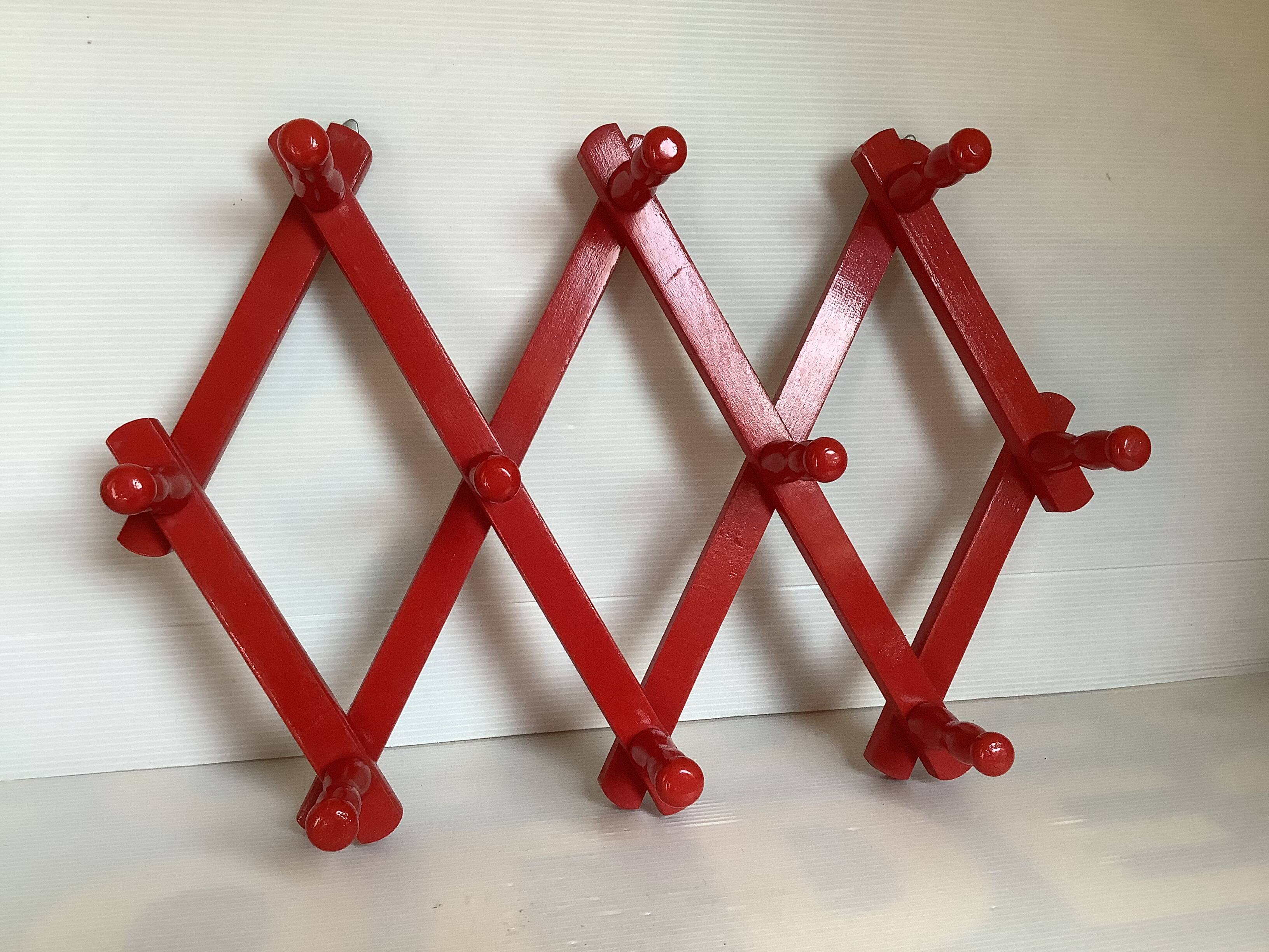 Red wood accordion coat rack