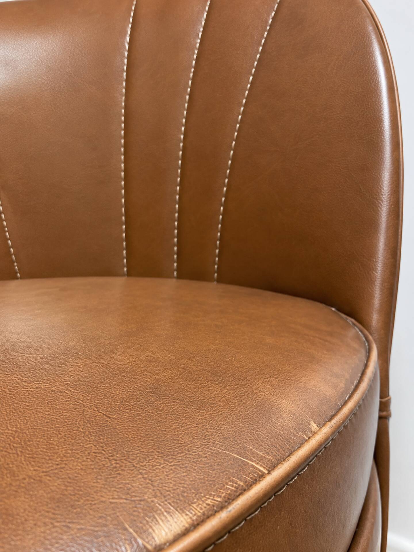 Vintage cognac fringe tub chairs