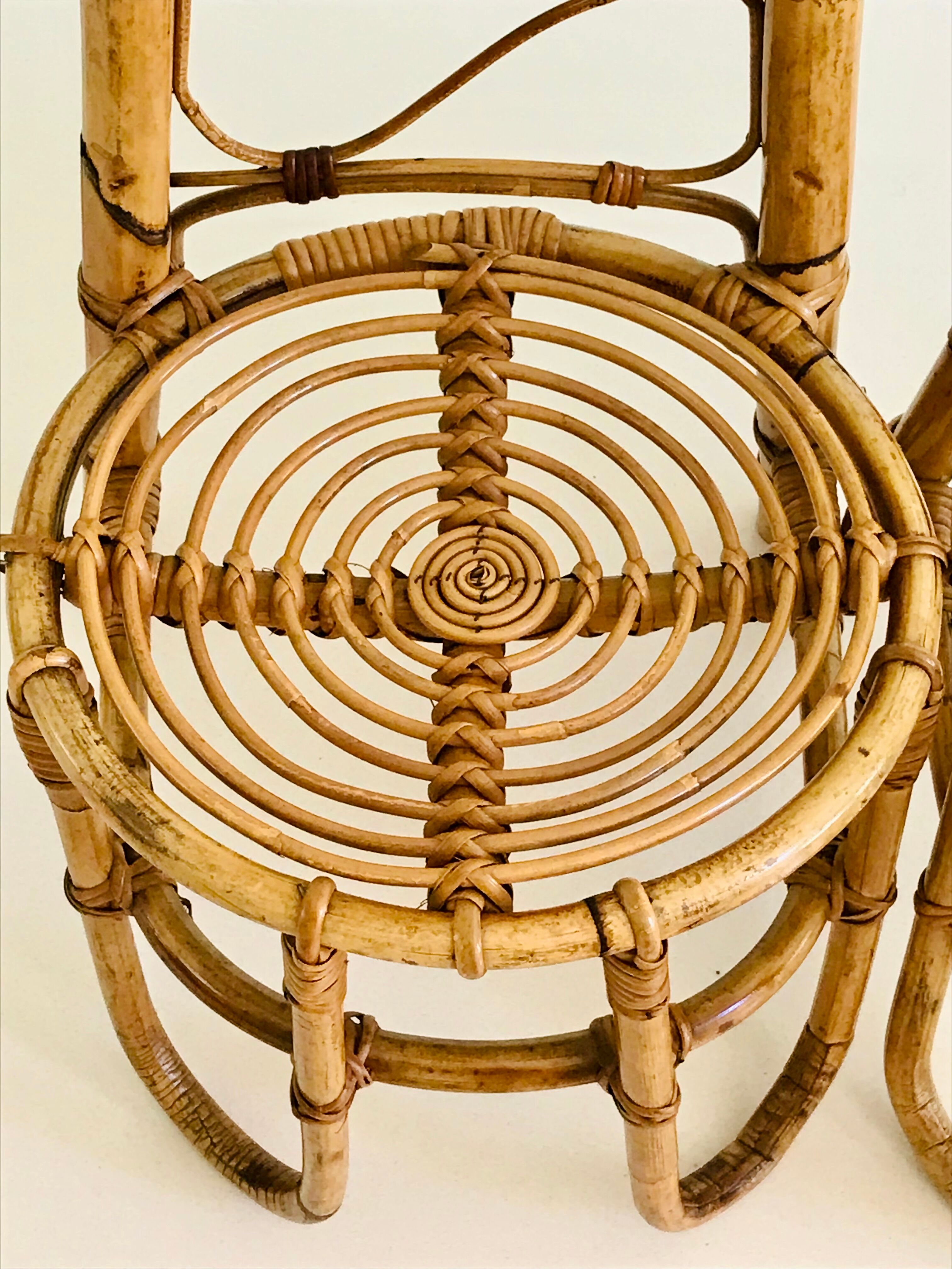 Pair of rattan chairs with high backrests, Italy 60s