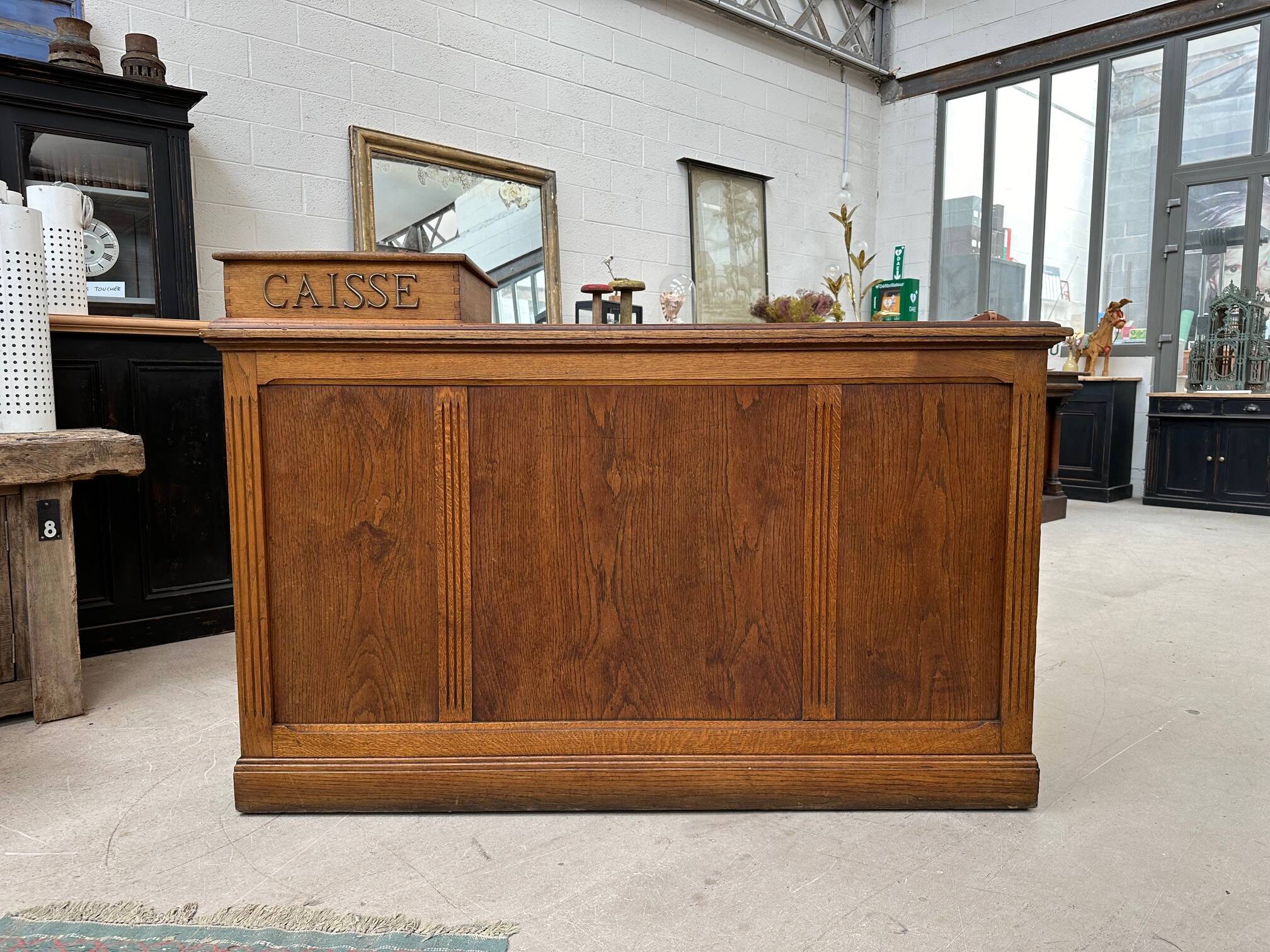 Oak cash register counter from the early 20th century