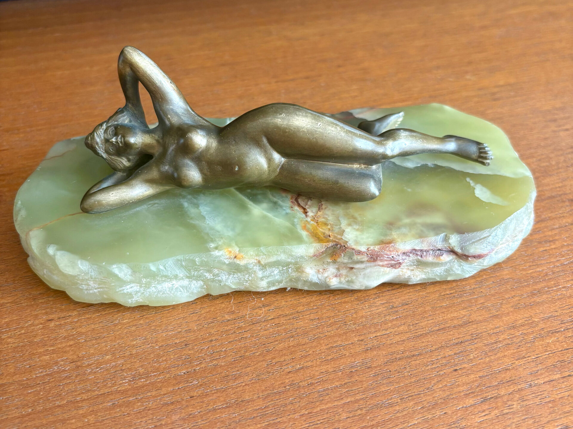 Art Deco female sculpture in bronze with onyx base.