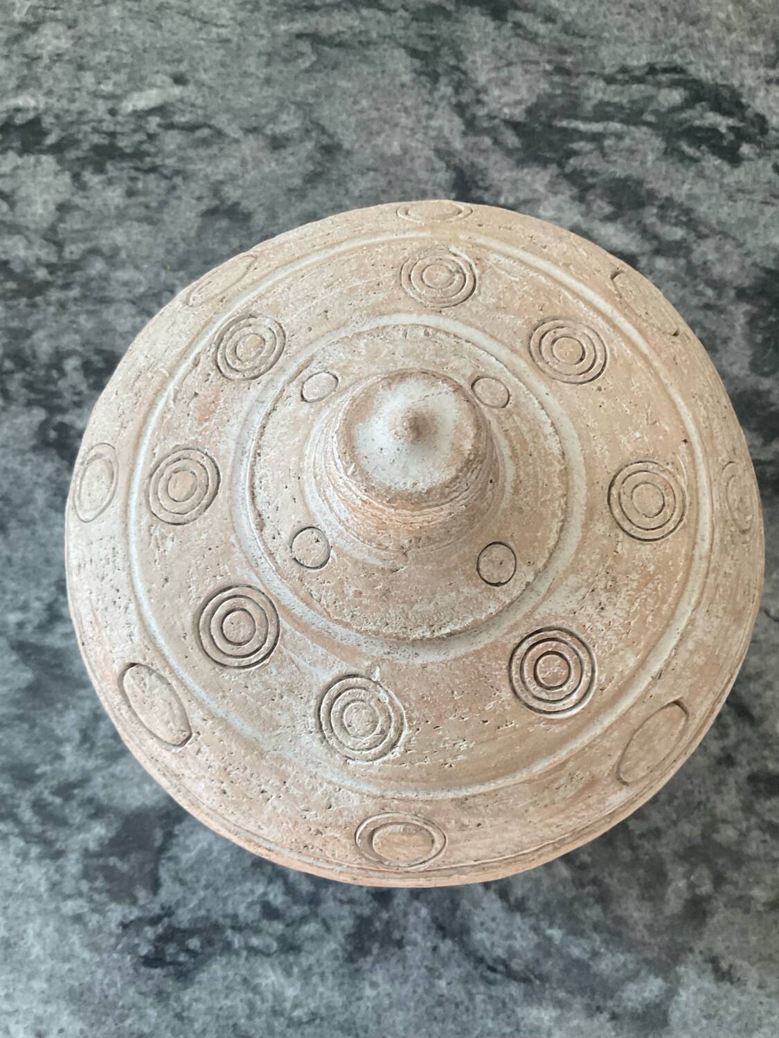 Vintage terracotta pot with lid.